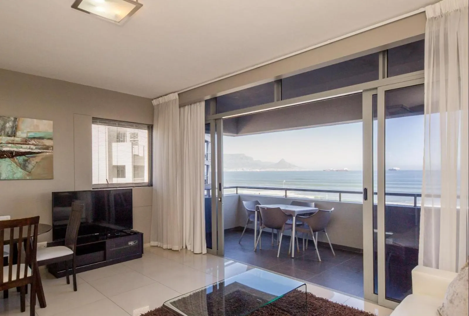 Infinity Self Catering Apartments Bloubergstrand Güney Afrika
